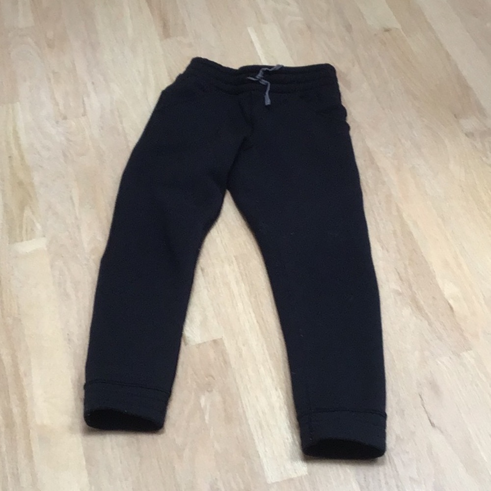 Black Ivivva sweat pants.